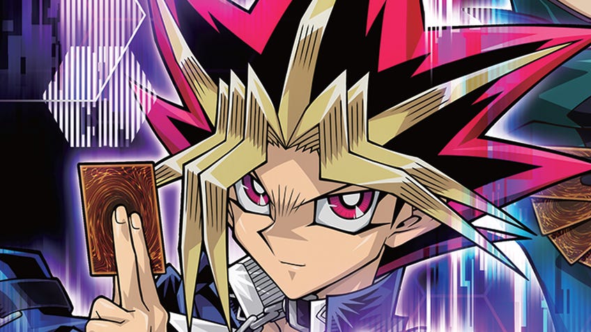 Yugi Moto holding a Yu-Gi-Oh card